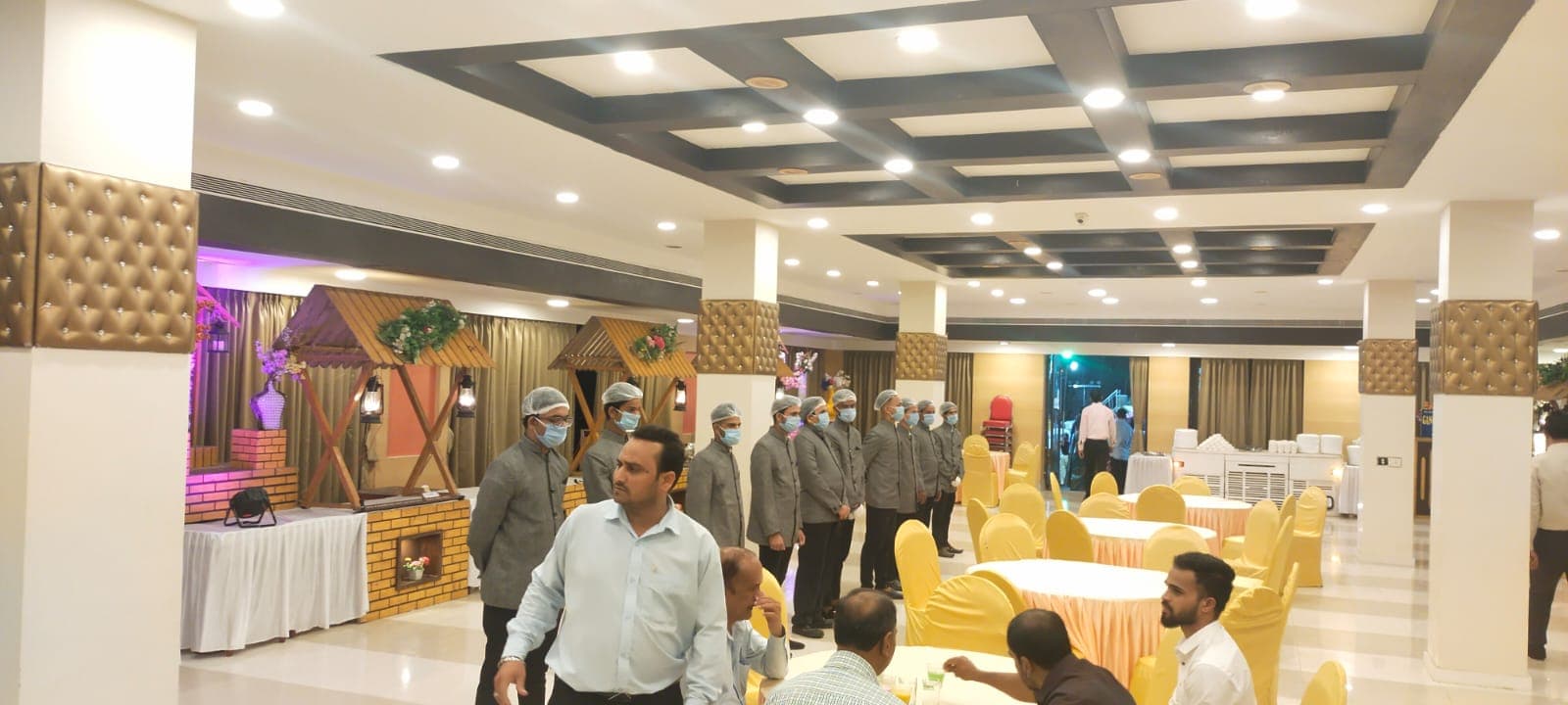 Uniformed staff inside Chembur banquet hall